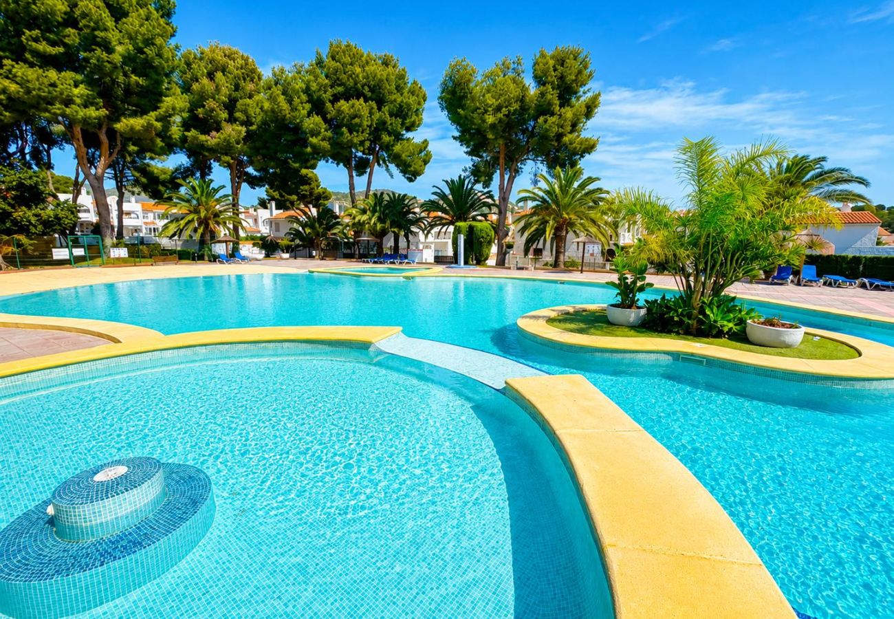 Villa en Calpe - Calpe Park, casa adosada con terraza y piscina · ideal para familias · parking incluido